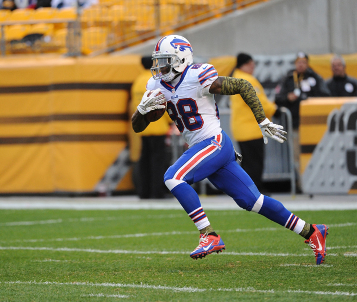 Kick returner Marquise Goodwin runs with the ball during a game against the Pittsburgh Steelers at Heinz Field on November 10, 2013 in Pittsburgh, Pennsylvania.